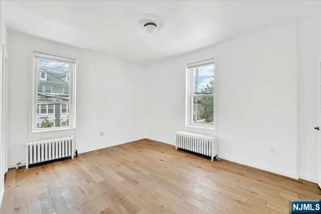 an empty room with windows