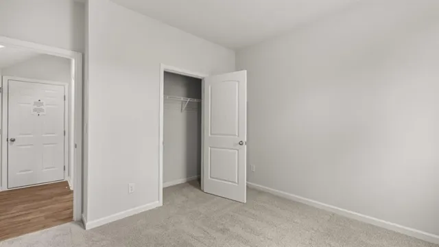 an empty room with closet