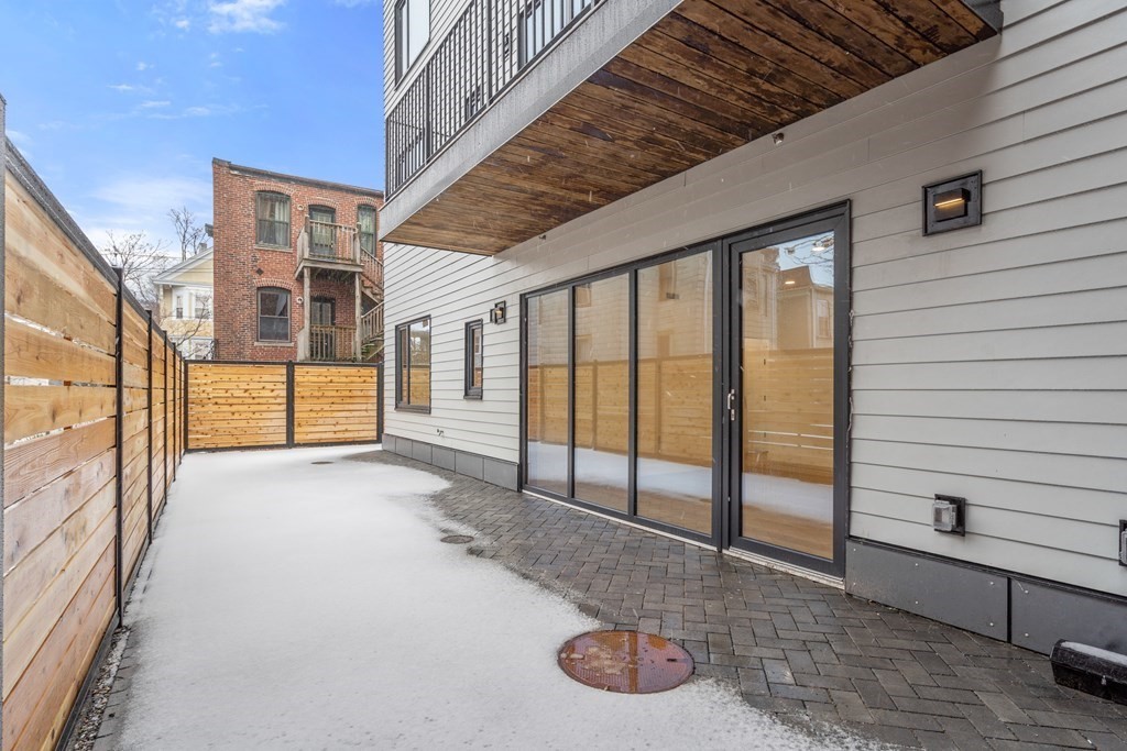 3171 Washington Street, Unit 101 Boston, MA 02130 - Photo 7 of 10 a view of an entryway with a building