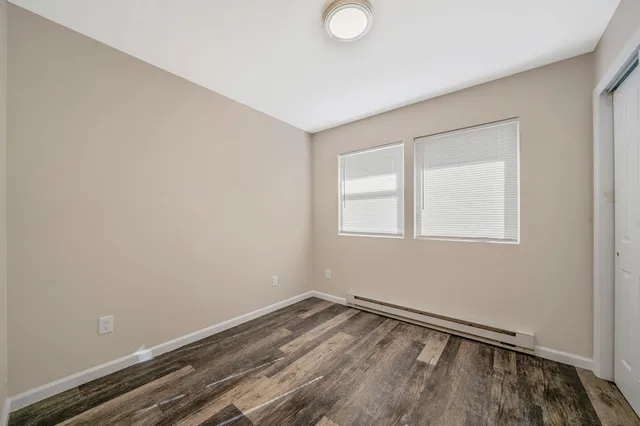 a view of a room that has a window in it