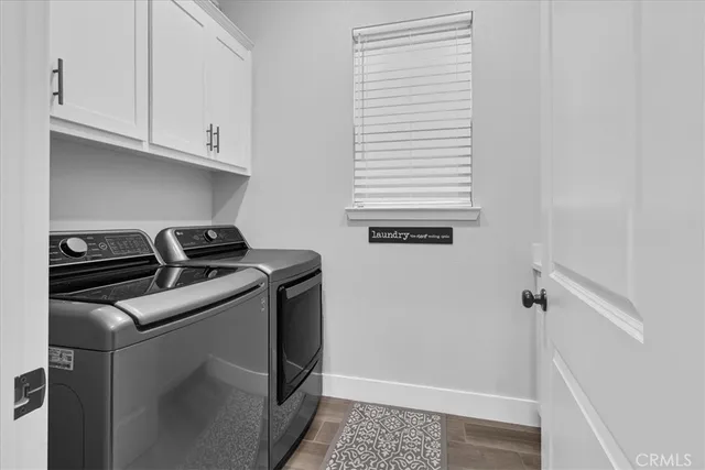 a close view of sink and cabinets