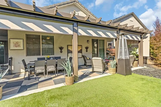 a house with garden in front of it