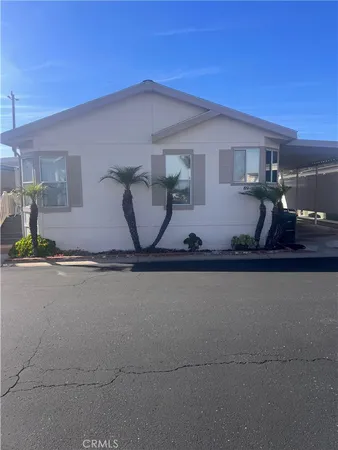 a view of a back yard of the house