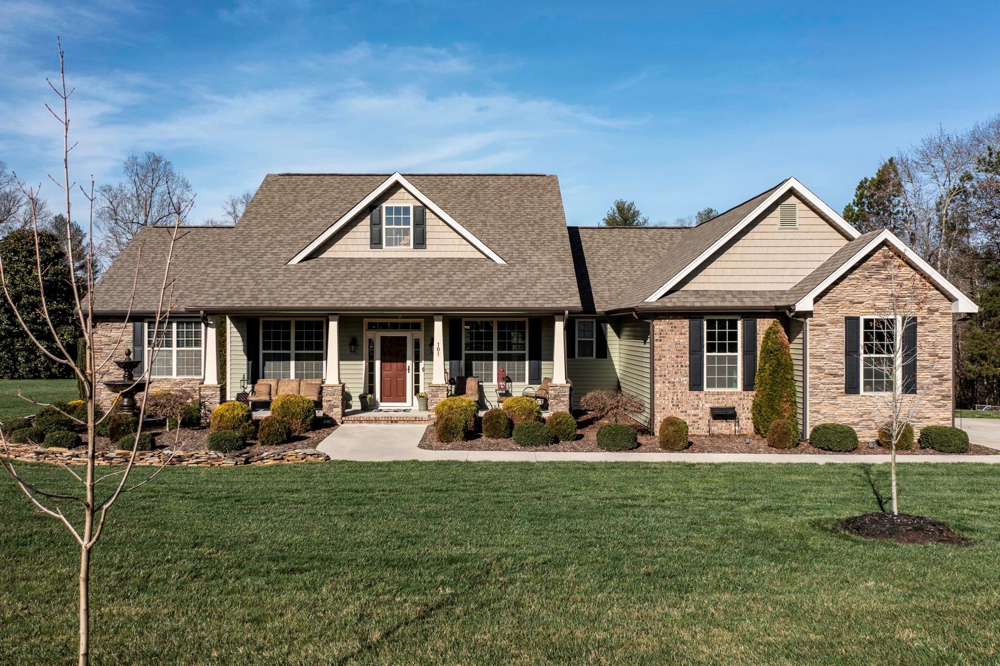 101 Ridge Top Drive Connelly Springs, NC 28612 - Photo 2 of 47 a front view of a house with patio