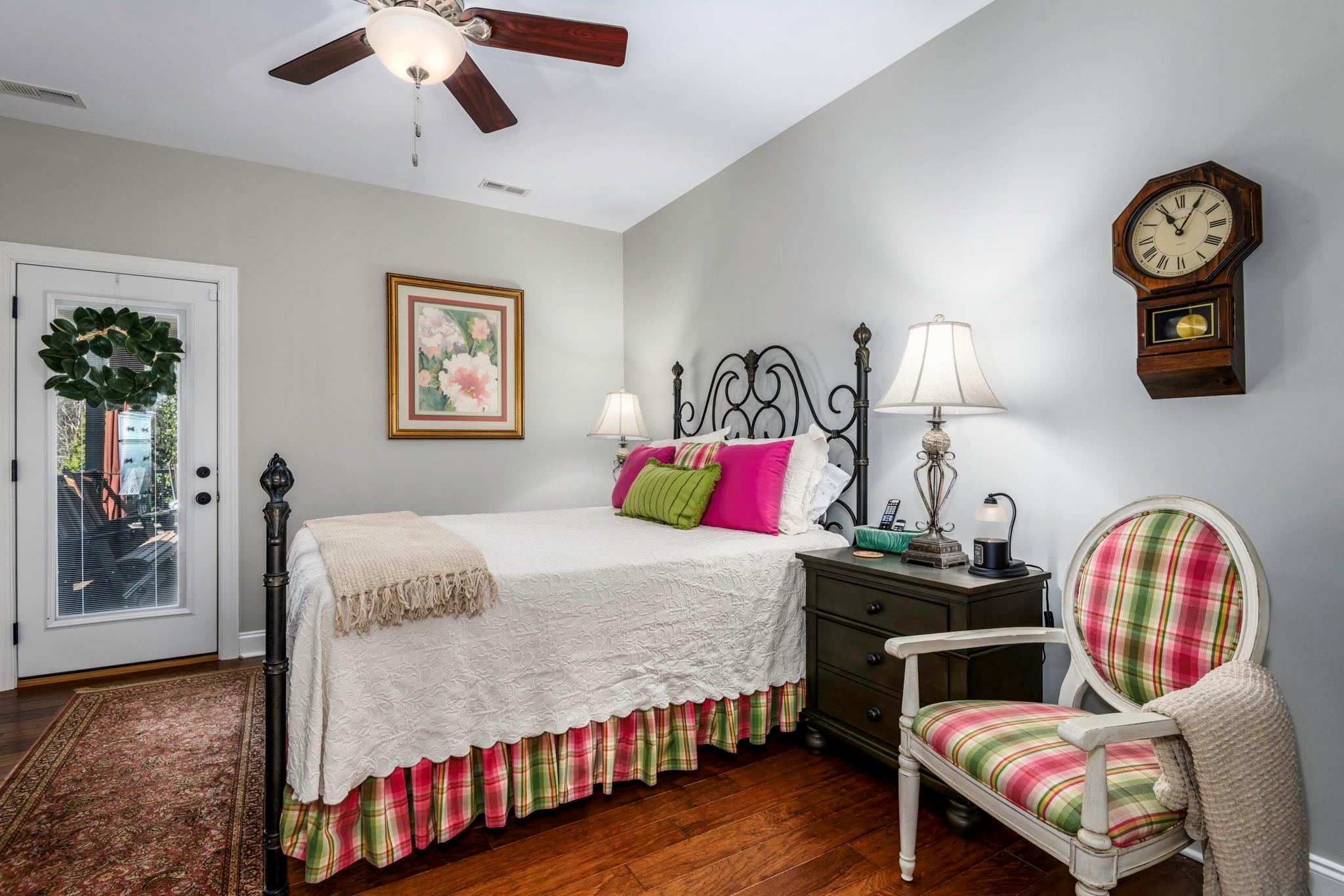 101 Ridge Top Drive Connelly Springs, NC 28612 - Photo 22 of 47 a bedroom with a bed and wooden floor