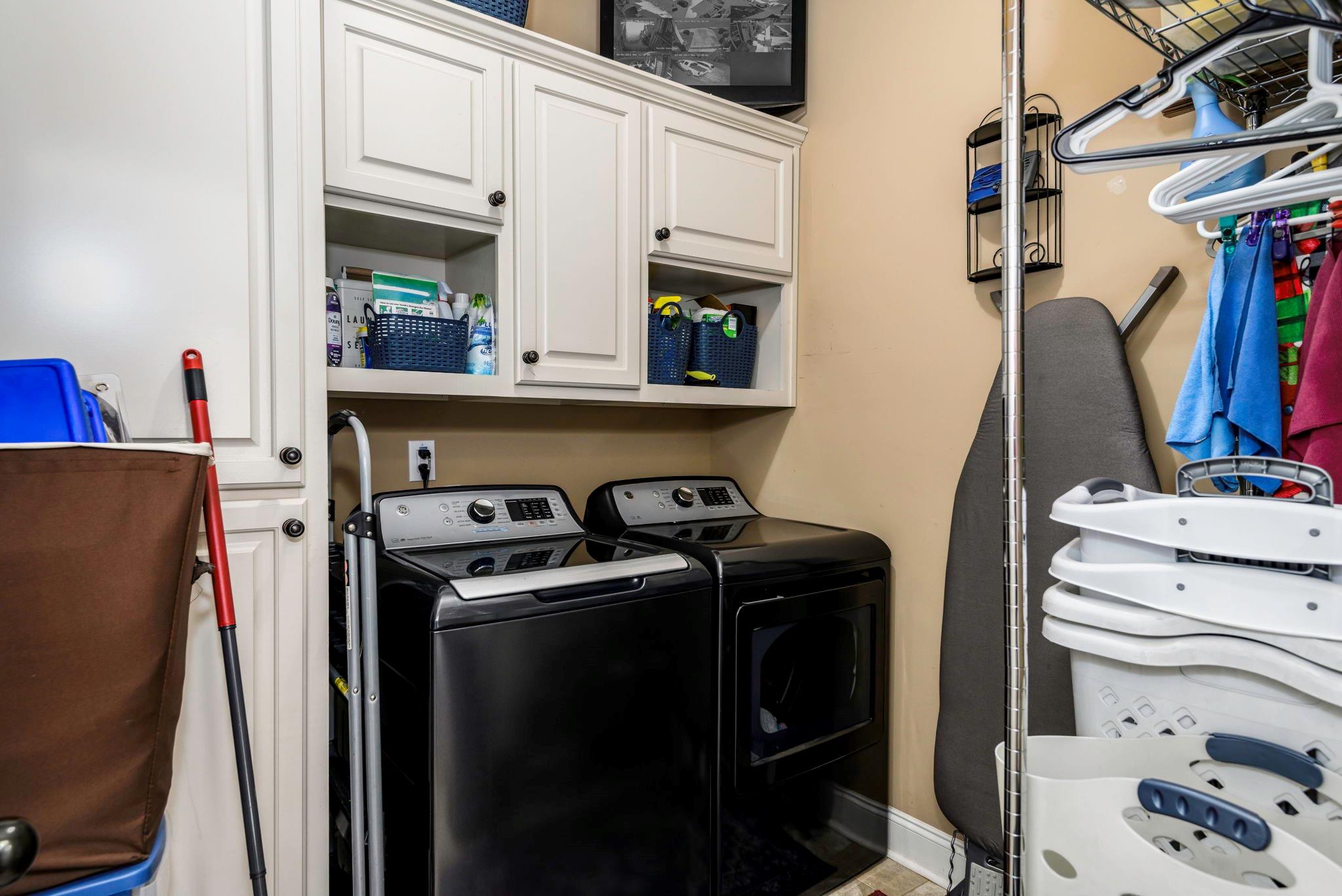 101 Ridge Top Drive Connelly Springs, NC 28612 - Photo 26 of 47 a utility room with dryer and washer