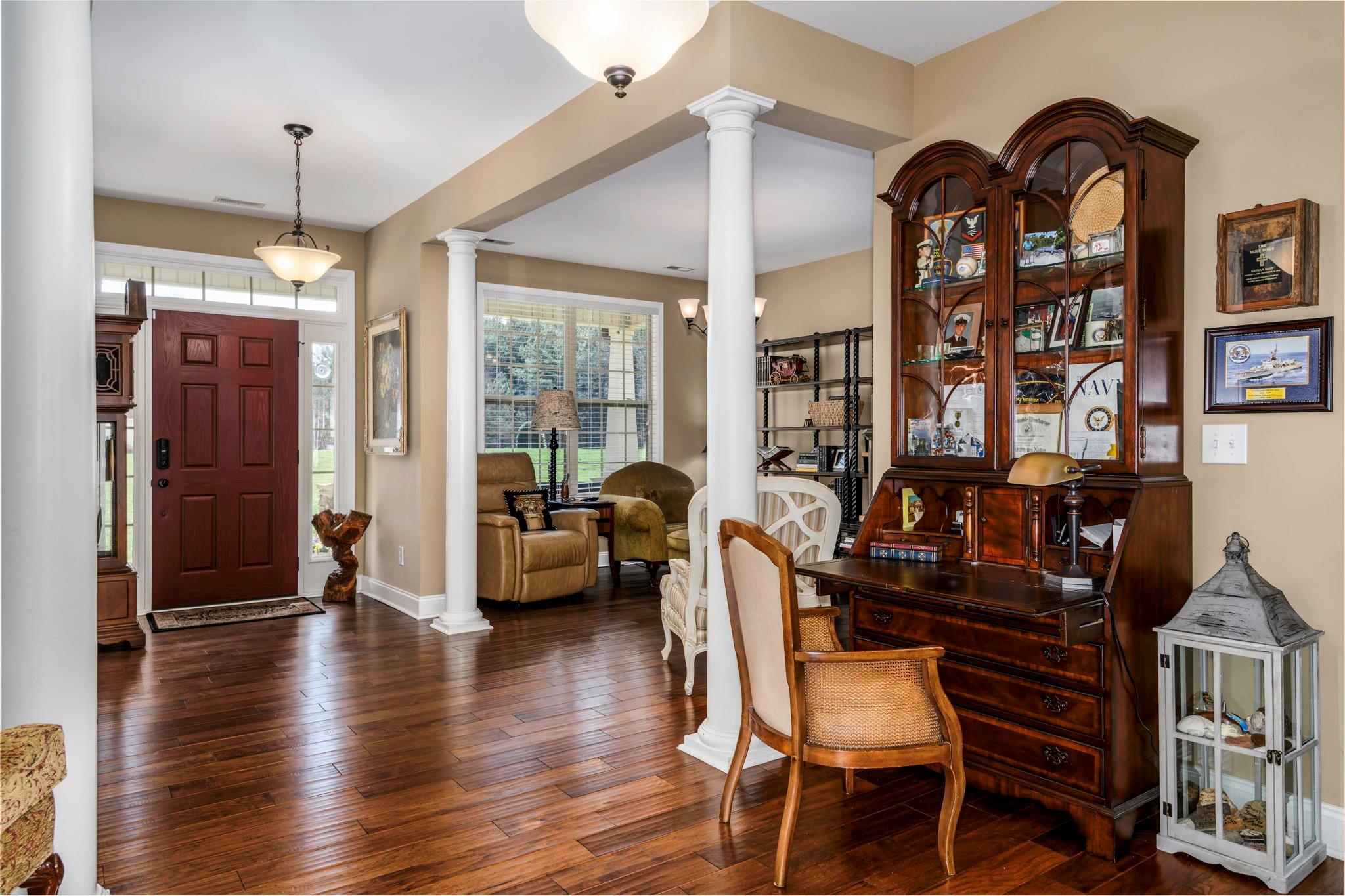 101 Ridge Top Drive Connelly Springs, NC 28612 - Photo 5 of 47 a view of a livingroom with furniture window and wooden floor