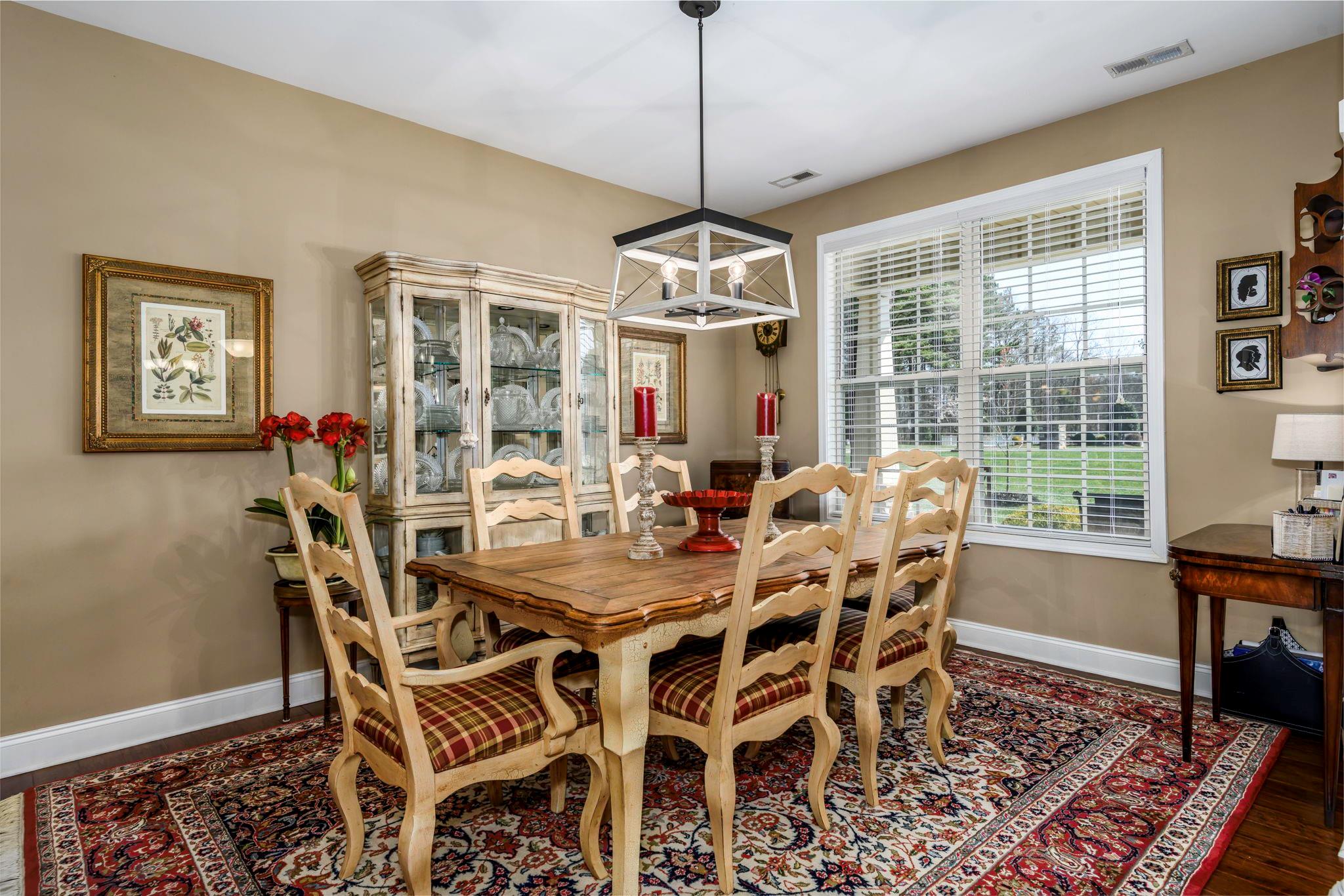 101 Ridge Top Drive Connelly Springs, NC 28612 - Photo 7 of 47 a view of a dining room with furniture window and outside view