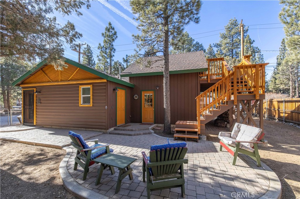 898 B Lane Big Bear City, CA 92314 - Photo 2 of 38 a patio with table and chairs