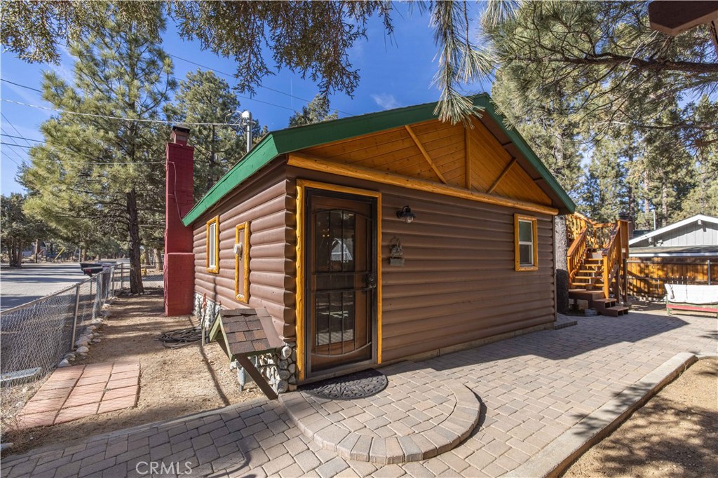 898 B Lane Big Bear City, CA 92314 - Photo 23 of 38 a view of a house with a yard