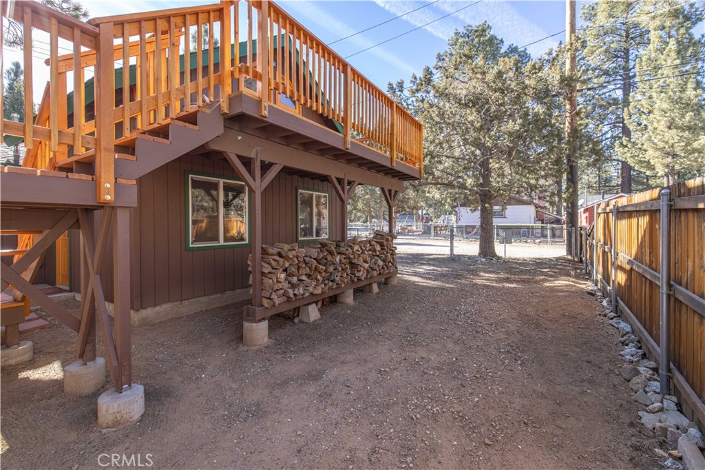 898 B Lane Big Bear City, CA 92314 - Photo 24 of 38 a view of a house with a yard