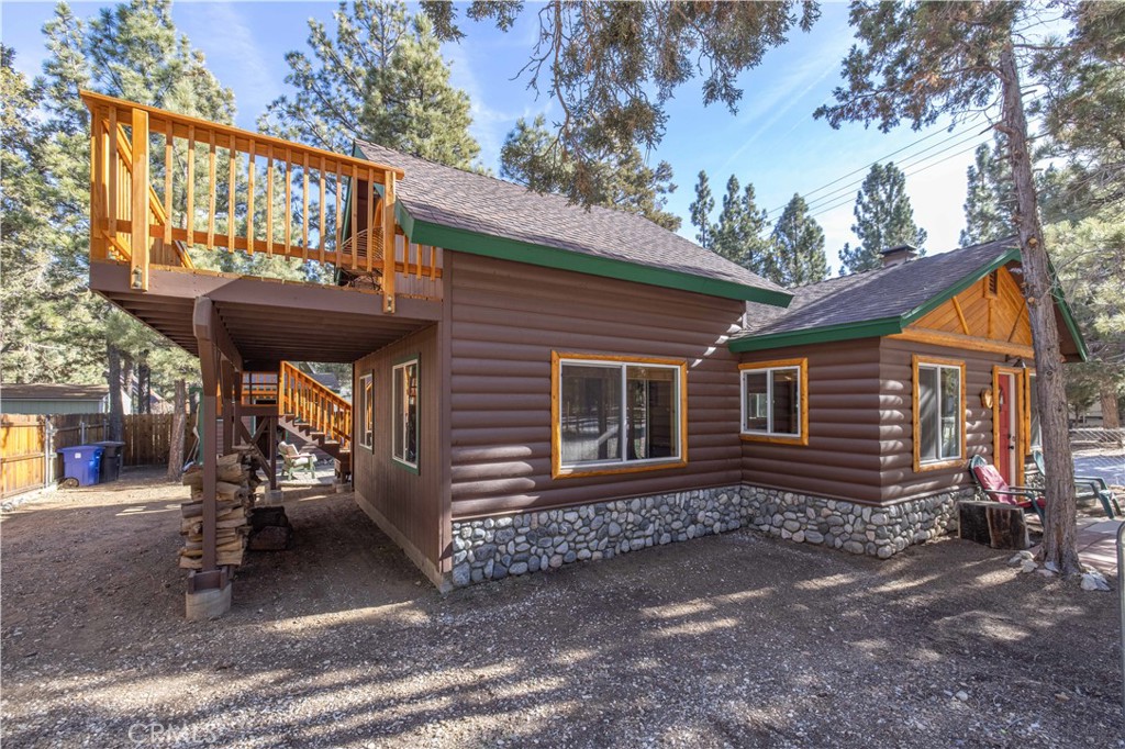 898 B Lane Big Bear City, CA 92314 - Photo 3 of 38 a view of a house with a yard and furniture
