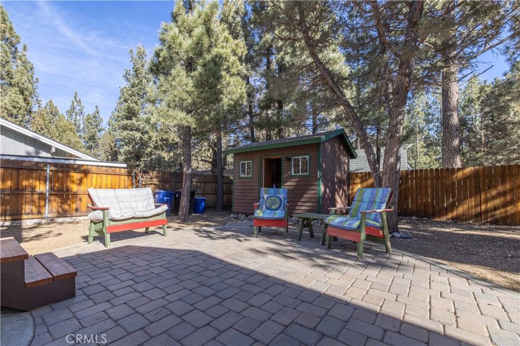 898 B Lane Big Bear City, CA 92314 - Photo 33 of 38 a view of outdoor space with seating area and barbeque oven
