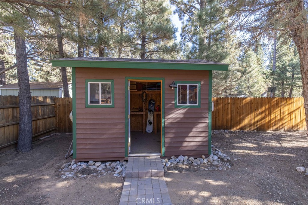 898 B Lane Big Bear City, CA 92314 - Photo 36 of 38 a view of a house with a yard