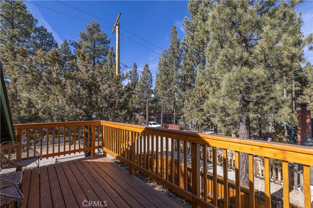 898 B Lane Big Bear City, CA 92314 - Photo 5 of 38 a view of a balcony with wooden floor