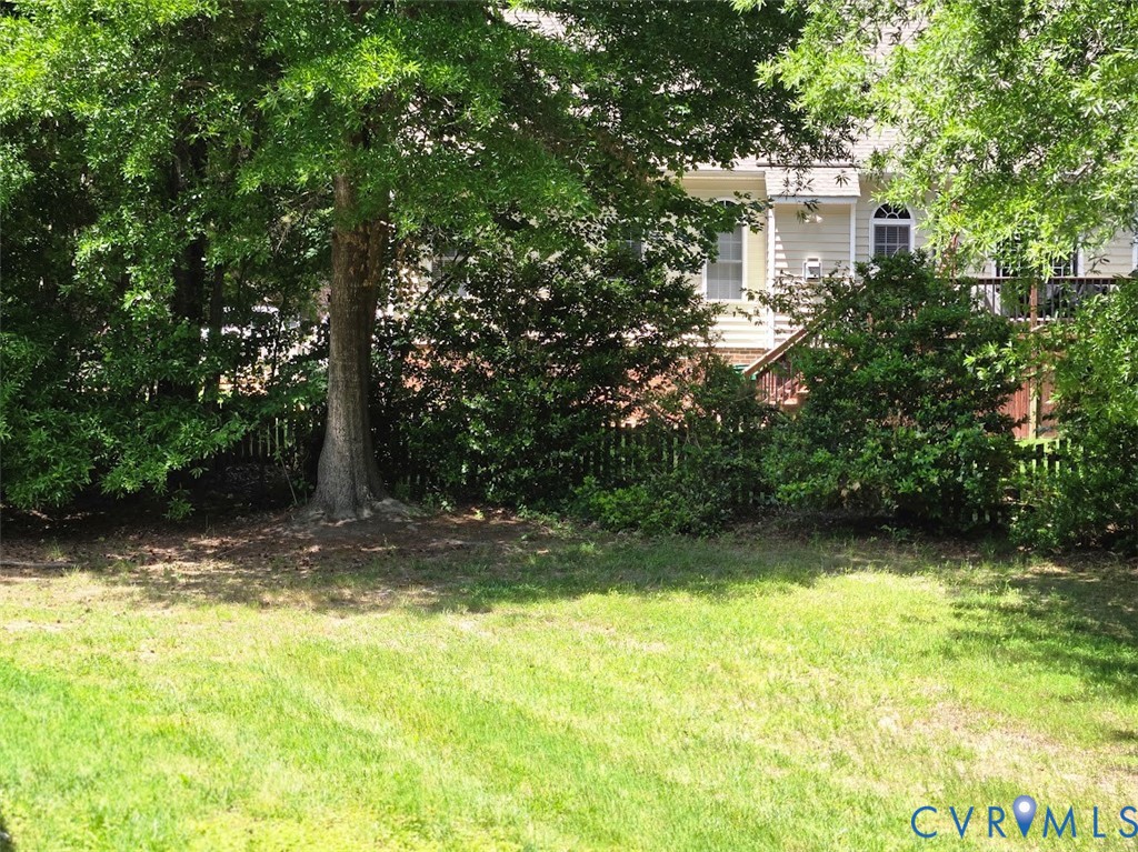16406 Benmore Road Moseley, VA 23120 - Photo 28 of 32 a view of a yard with plants and trees