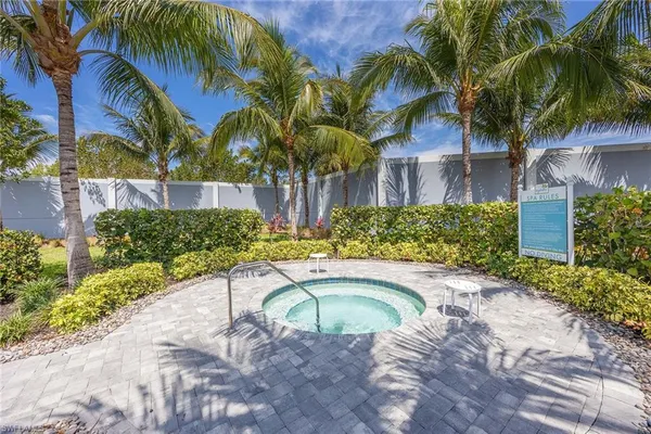 a view of a swimming pool with a garden