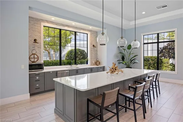 a dining room with furniture and window