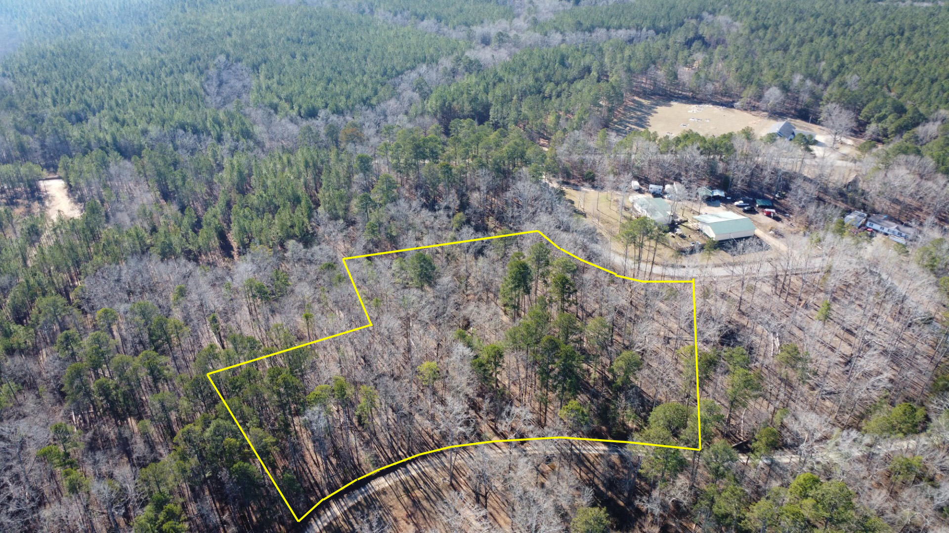 Drone photo with approximate property lines marked