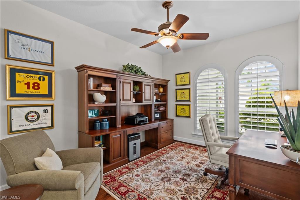 9774 Nickel Ridge Circle Naples, FL 34120 - Photo 23 of 50 a living room with furniture and a window