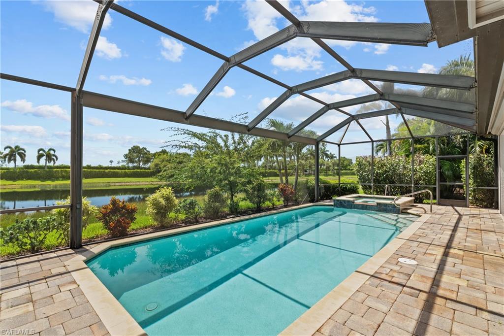 9774 Nickel Ridge Circle Naples, FL 34120 - Photo 32 of 50 a view of swimming pool with a patio