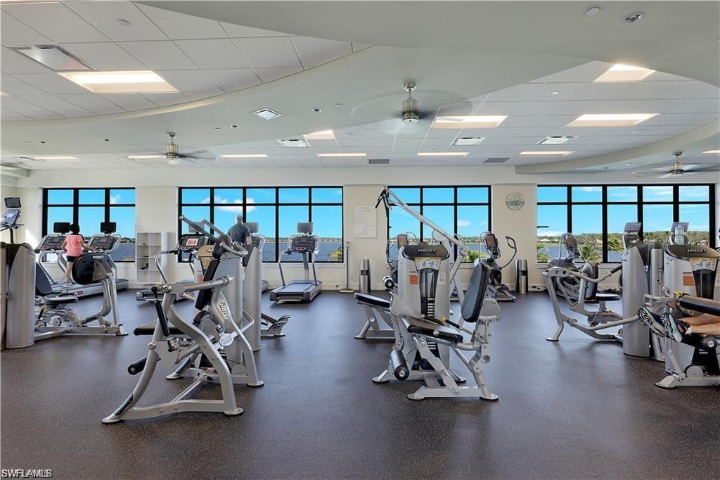 9774 Nickel Ridge Circle Naples, FL 34120 - Photo 46 of 50 a view of a room with gym equipment