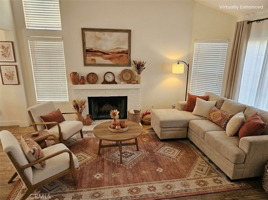 1376 Darwin Drive Oceanside, CA 92056 - Photo 16 of 22 a living room with furniture and a fireplace