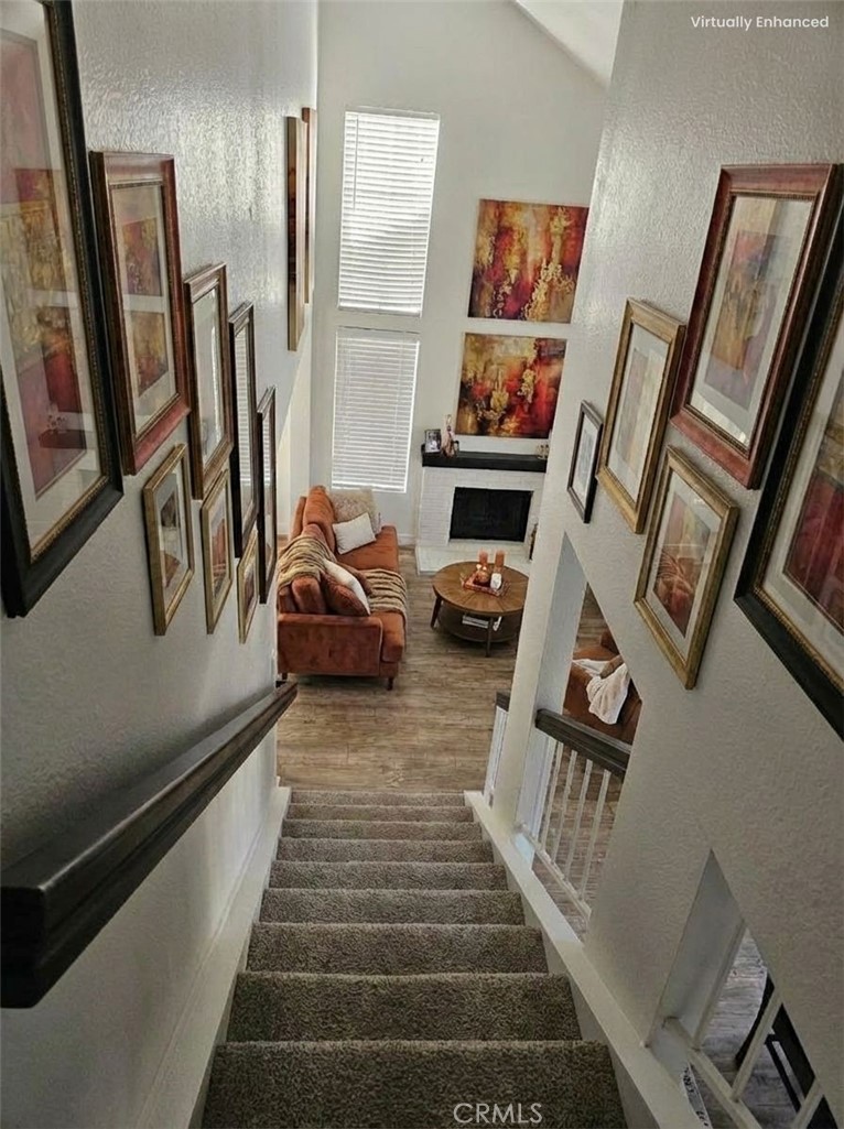 1376 Darwin Drive Oceanside, CA 92056 - Photo 20 of 22 a living room with furniture and a flat screen tv