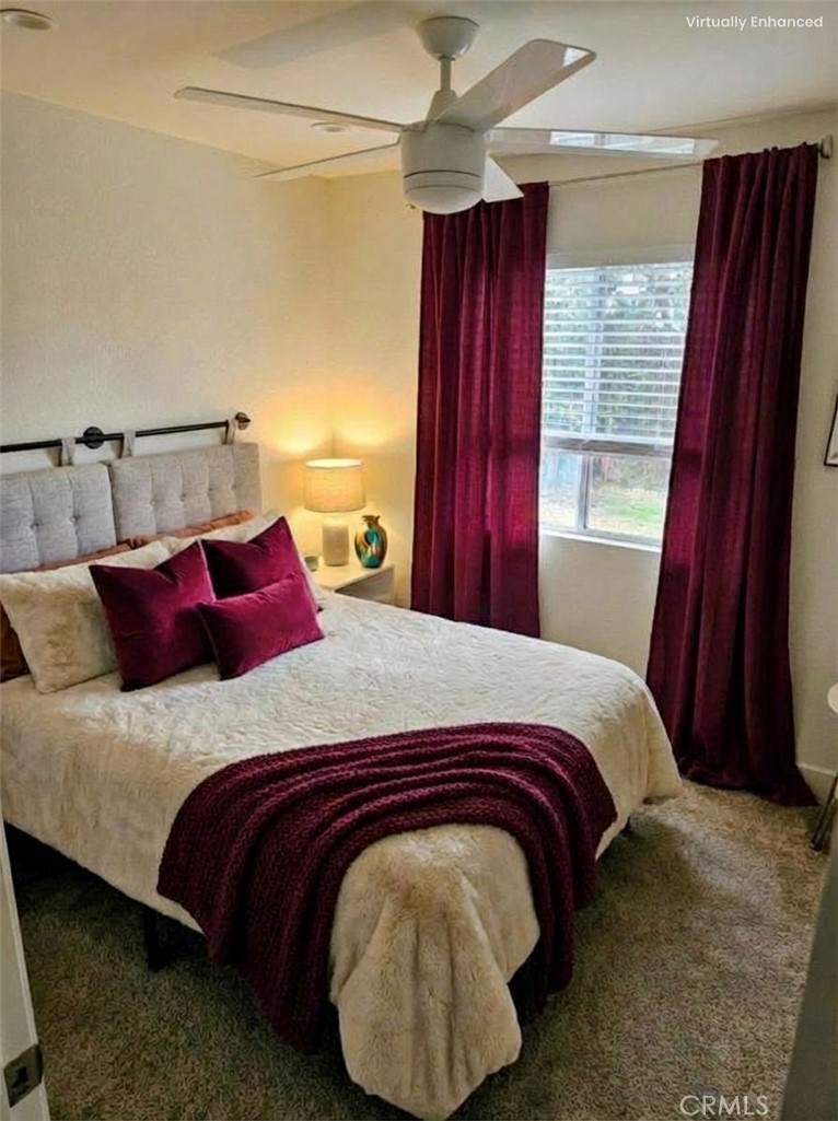 1376 Darwin Drive Oceanside, CA 92056 - Photo 9 of 22 a bedroom with a bed and window