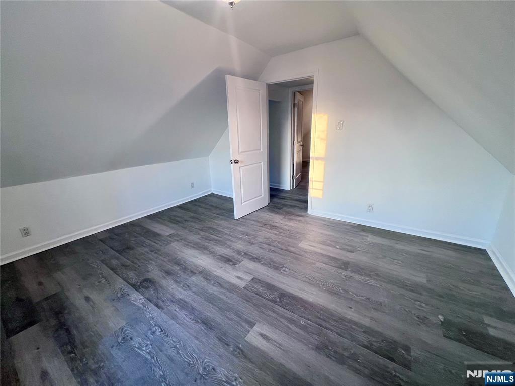 17 North Summit Street, Unit 2 Bergenfield, NJ 07621 - Photo 11 of 13 a view of an empty room with wooden floor and a window