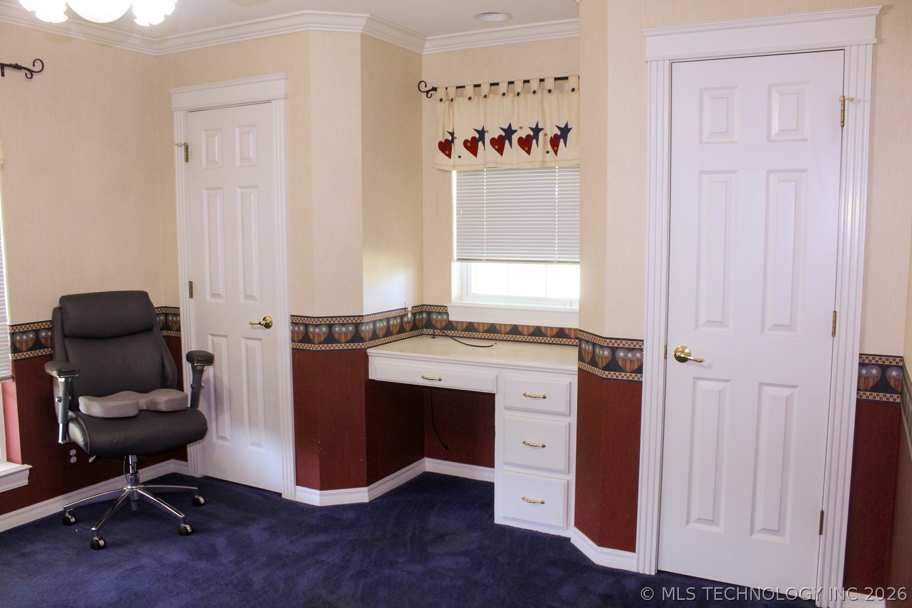 13248 North 3540th Road Maud, OK 74854 - Photo 56 of 98 Built-in corner desk with three drawers, integrated window, and crown molding