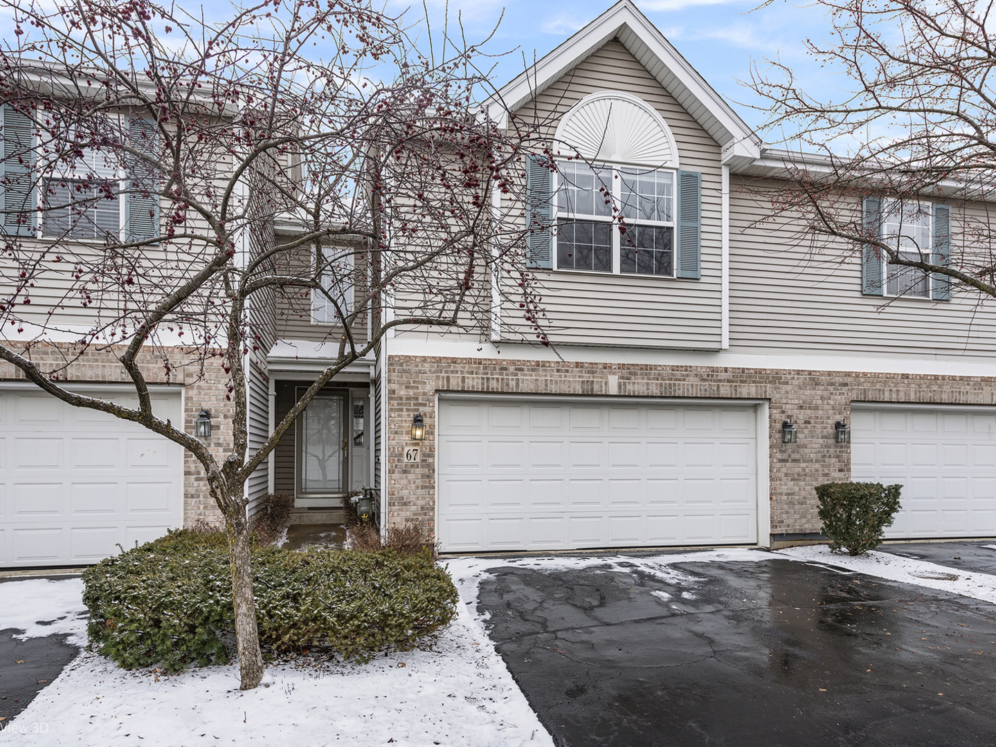 67 Colonial Court Streamwood, IL 60107 - Photo 1 of 25 a front view of a house