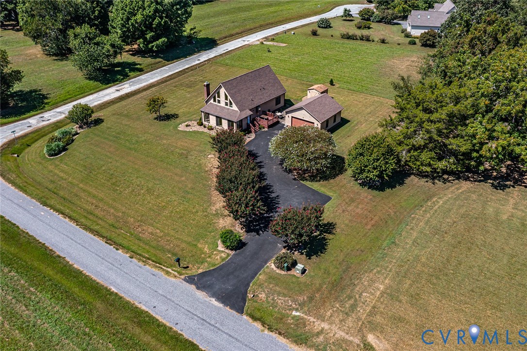 831 Fountain Gate Road Heathsville, VA 22473 - Photo 1 of 50 an aerial view of a house with a yard