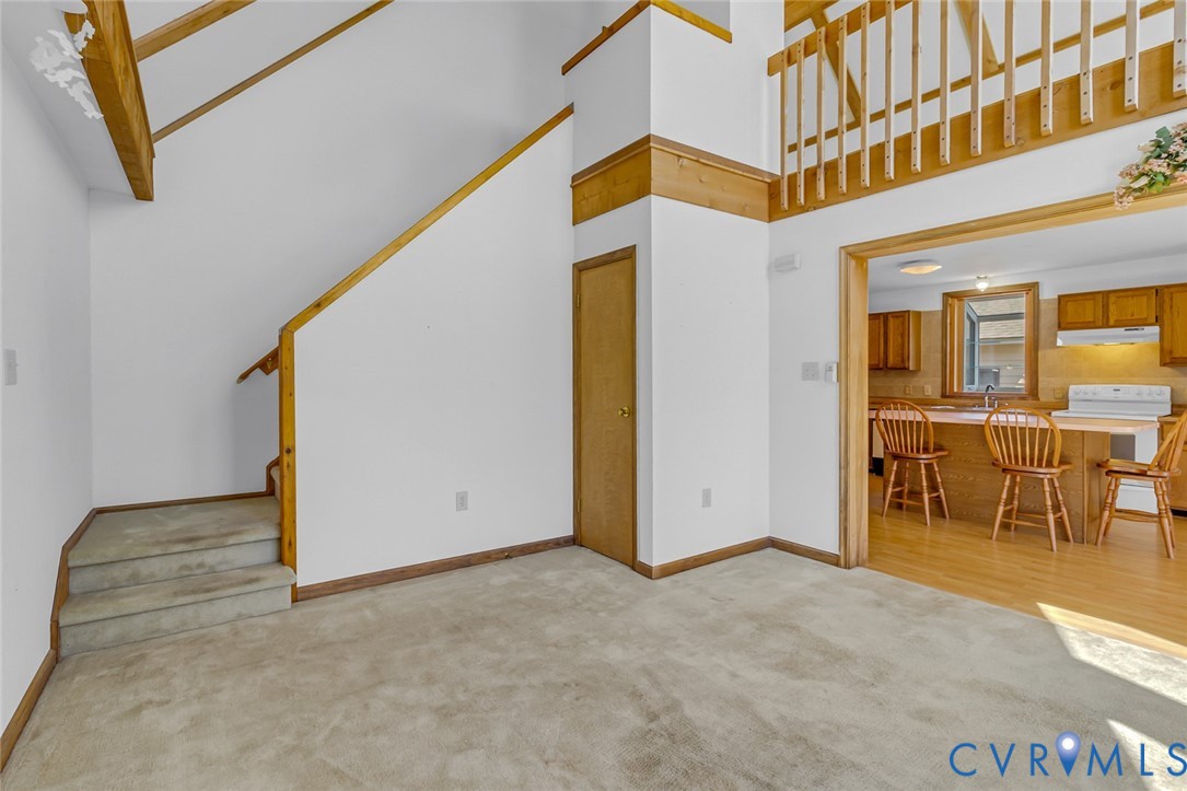 831 Fountain Gate Road Heathsville, VA 22473 - Photo 14 of 50 a view of a living room with a balcony