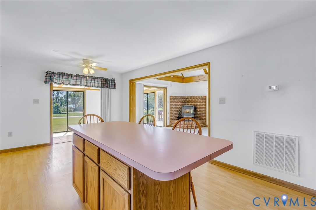 831 Fountain Gate Road Heathsville, VA 22473 - Photo 17 of 50 a room with pool table and windows