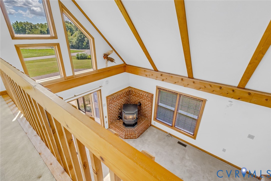 831 Fountain Gate Road Heathsville, VA 22473 - Photo 29 of 50 a view of a house with a balcony