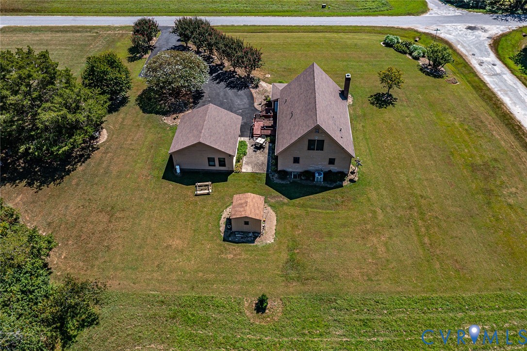 831 Fountain Gate Road Heathsville, VA 22473 - Photo 34 of 50 an aerial view of a house with a swimming pool