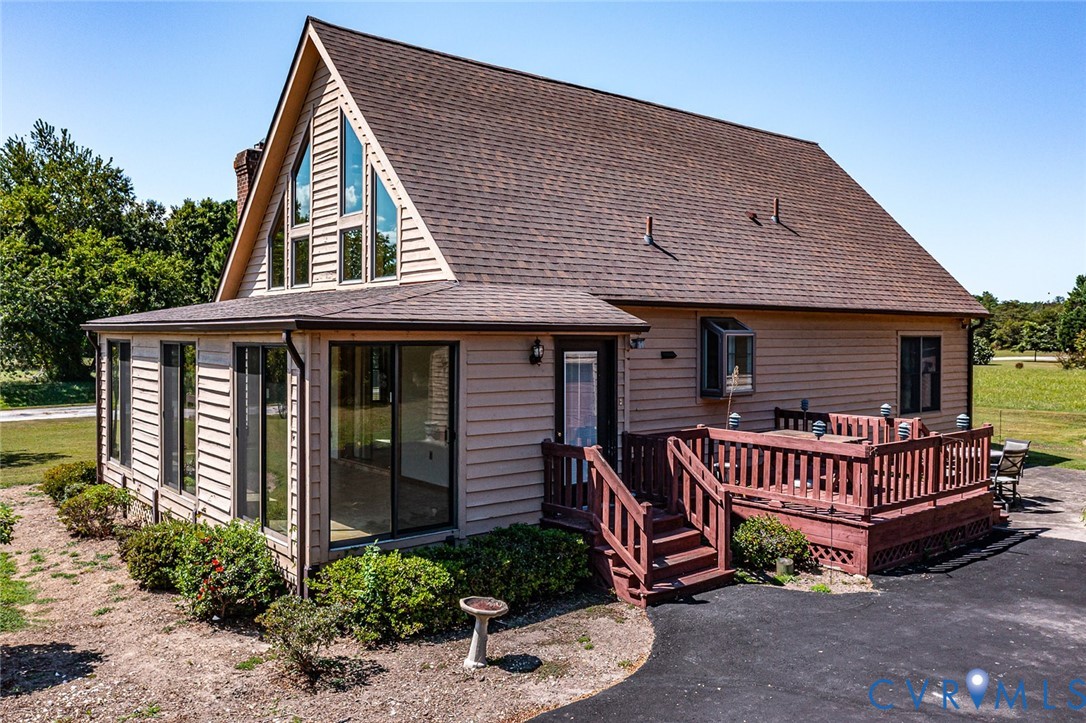 831 Fountain Gate Road Heathsville, VA 22473 - Photo 40 of 50 a front view of a house with garden