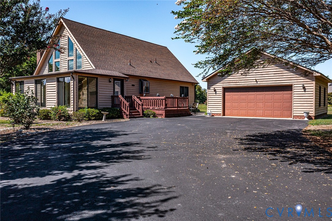 831 Fountain Gate Road Heathsville, VA 22473 - Photo 41 of 50 a front view of a house with garden