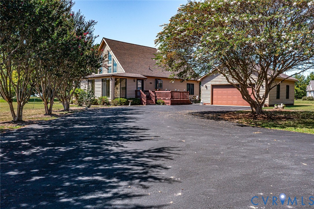 831 Fountain Gate Road Heathsville, VA 22473 - Photo 49 of 50 a front view of a house with a yard