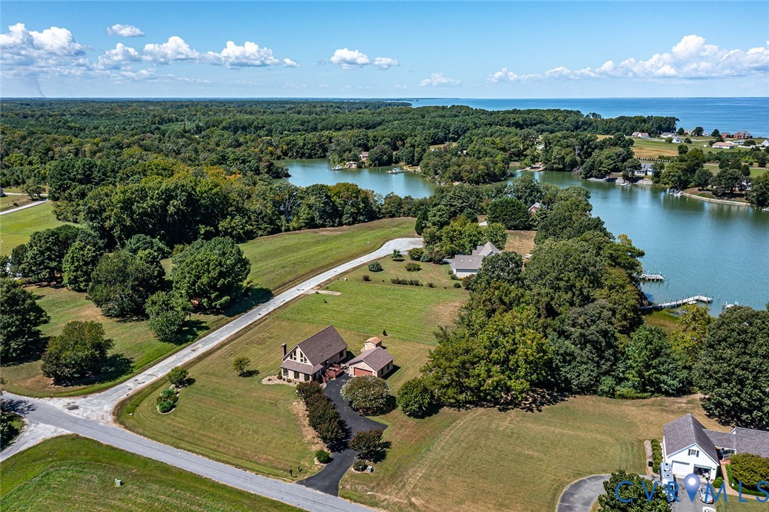 831 Fountain Gate Road Heathsville, VA 22473 - Photo 6 of 50 an aerial view of a houses with a yard