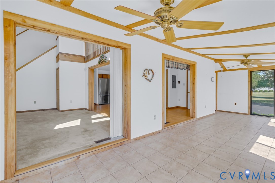 831 Fountain Gate Road Heathsville, VA 22473 - Photo 10 of 50 a view of a hallway with a chandelier