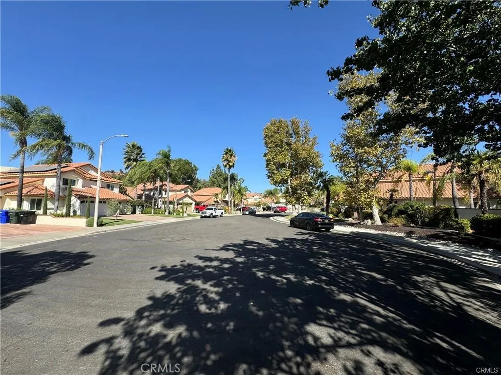 0 Chicory Court Stevenson Ranch, CA 91381 - Photo 2 of 6 a group of cars parked on the side of a street