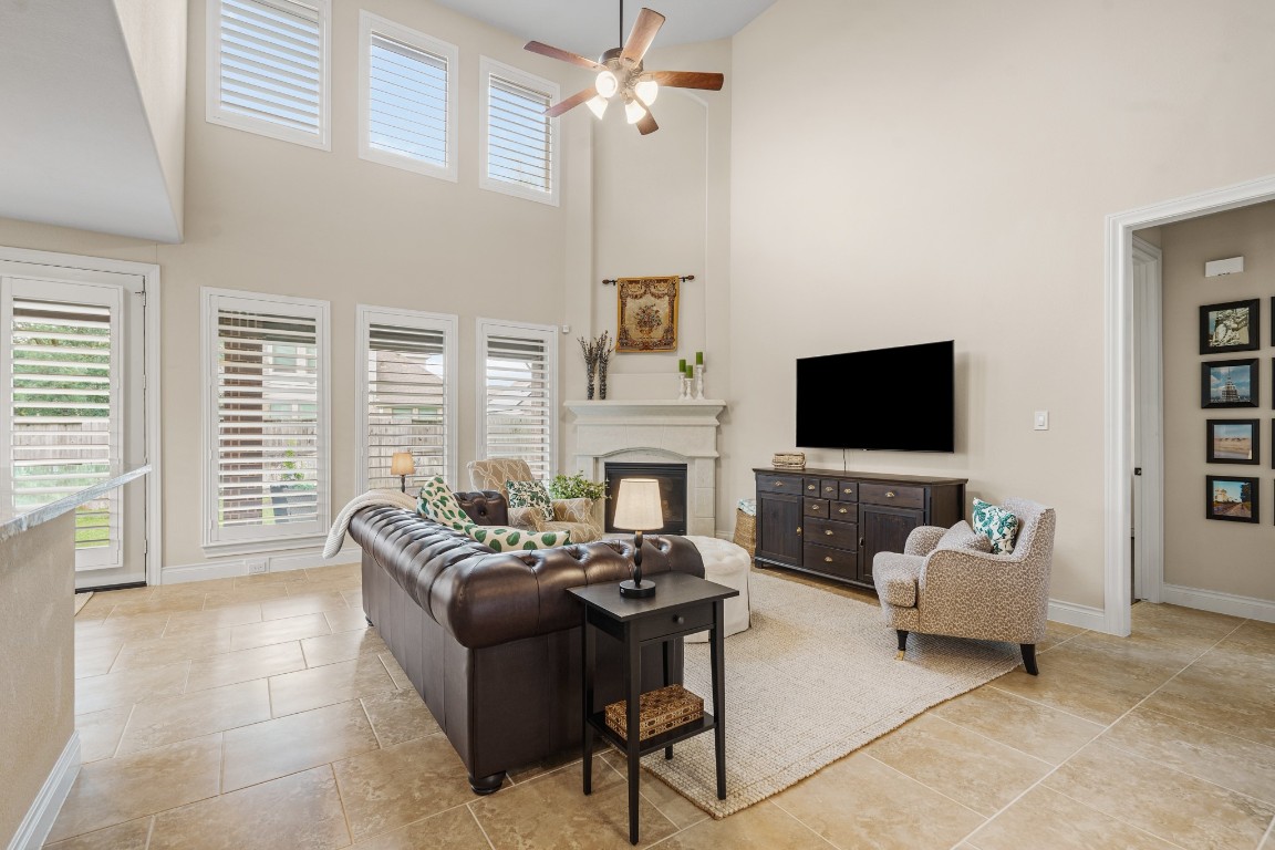 1607 Quail Ridge Drive Katy, TX 77493 - Photo 14 of 33 This living room goes beyond just an indoor entertaining space and can be opened up via the back door to an oversized patio and huge backyard! Talk about the perfect indoor-outdoor entertaining space.