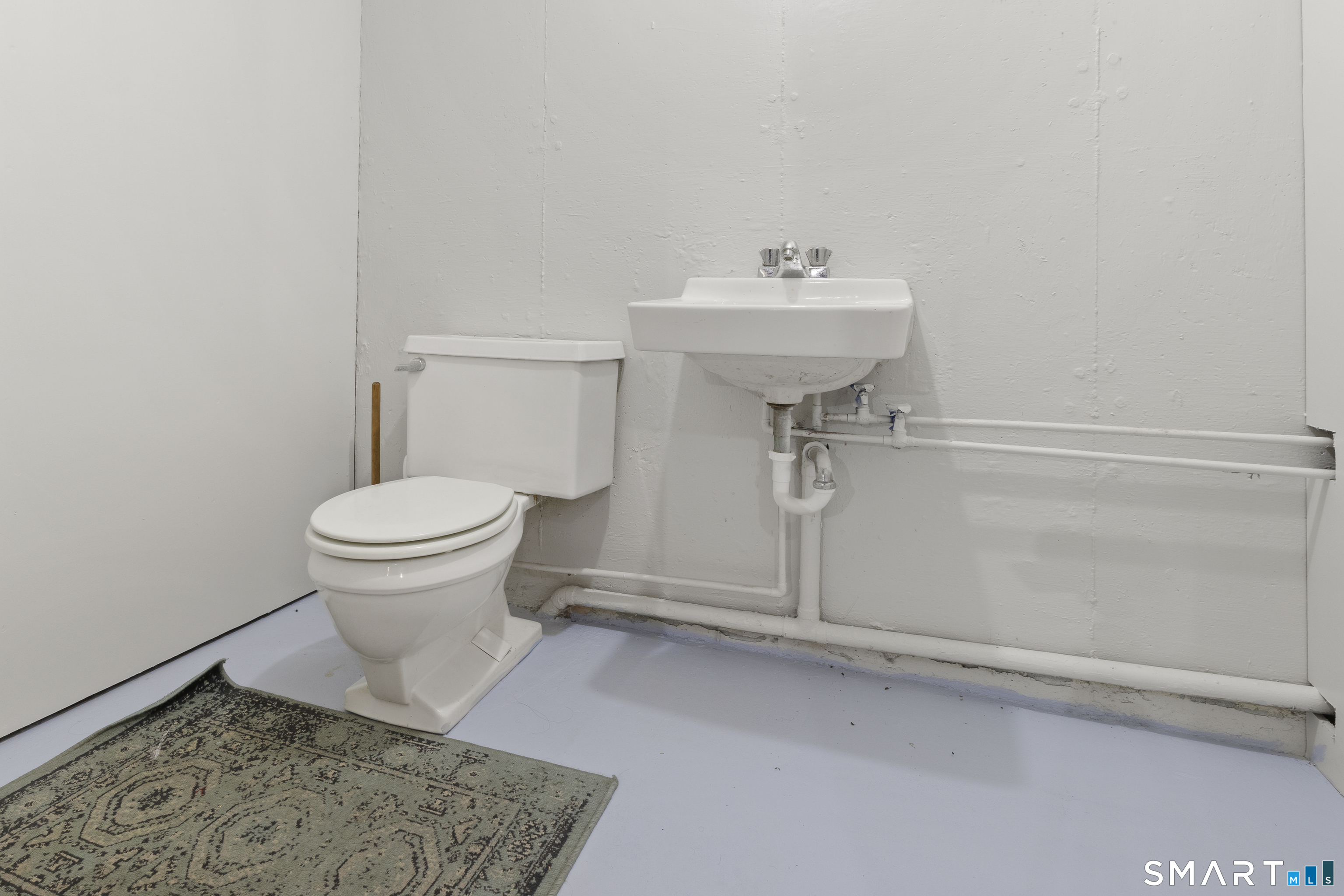 11 Munyan Road Putnam, CT 06260 - Photo 23 of 33 a bathroom with a sink toilet and shower