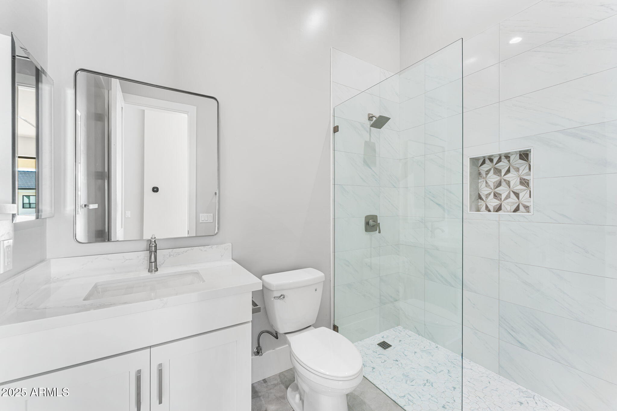 24614 South 183rd Street Gilbert, AZ 85298 - Photo 29 of 45 a bathroom with a sink a toilet and shower