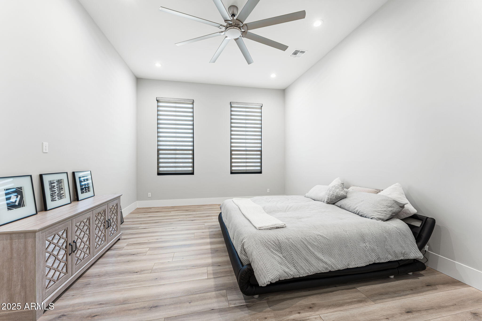 24614 South 183rd Street Gilbert, AZ 85298 - Photo 30 of 45 a bedroom with a large bed and a window