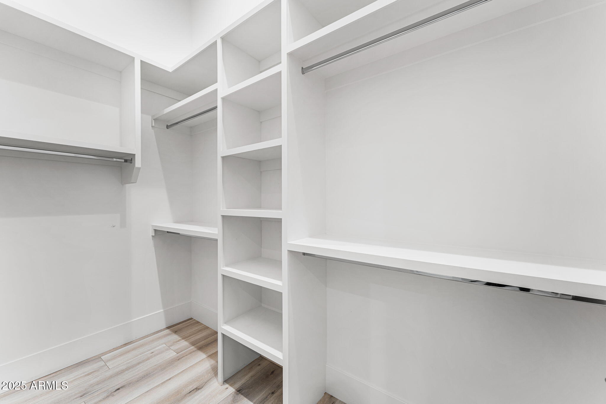 24614 South 183rd Street Gilbert, AZ 85298 - Photo 32 of 45 a view of walk in closet with empty racks