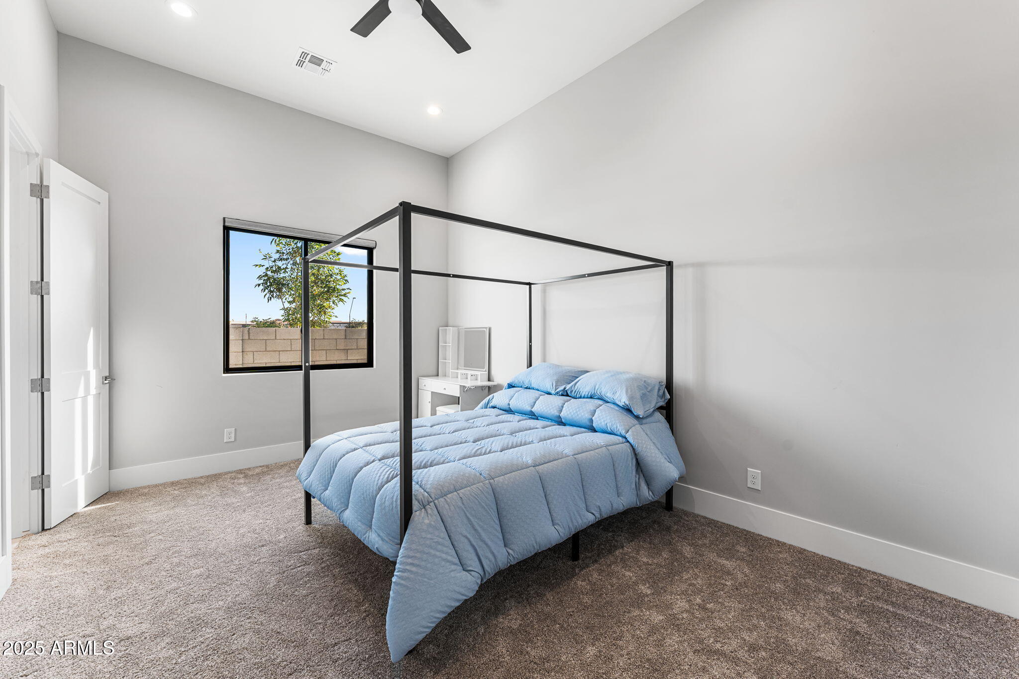 24614 South 183rd Street Gilbert, AZ 85298 - Photo 37 of 45 a bedroom with a bed and a window