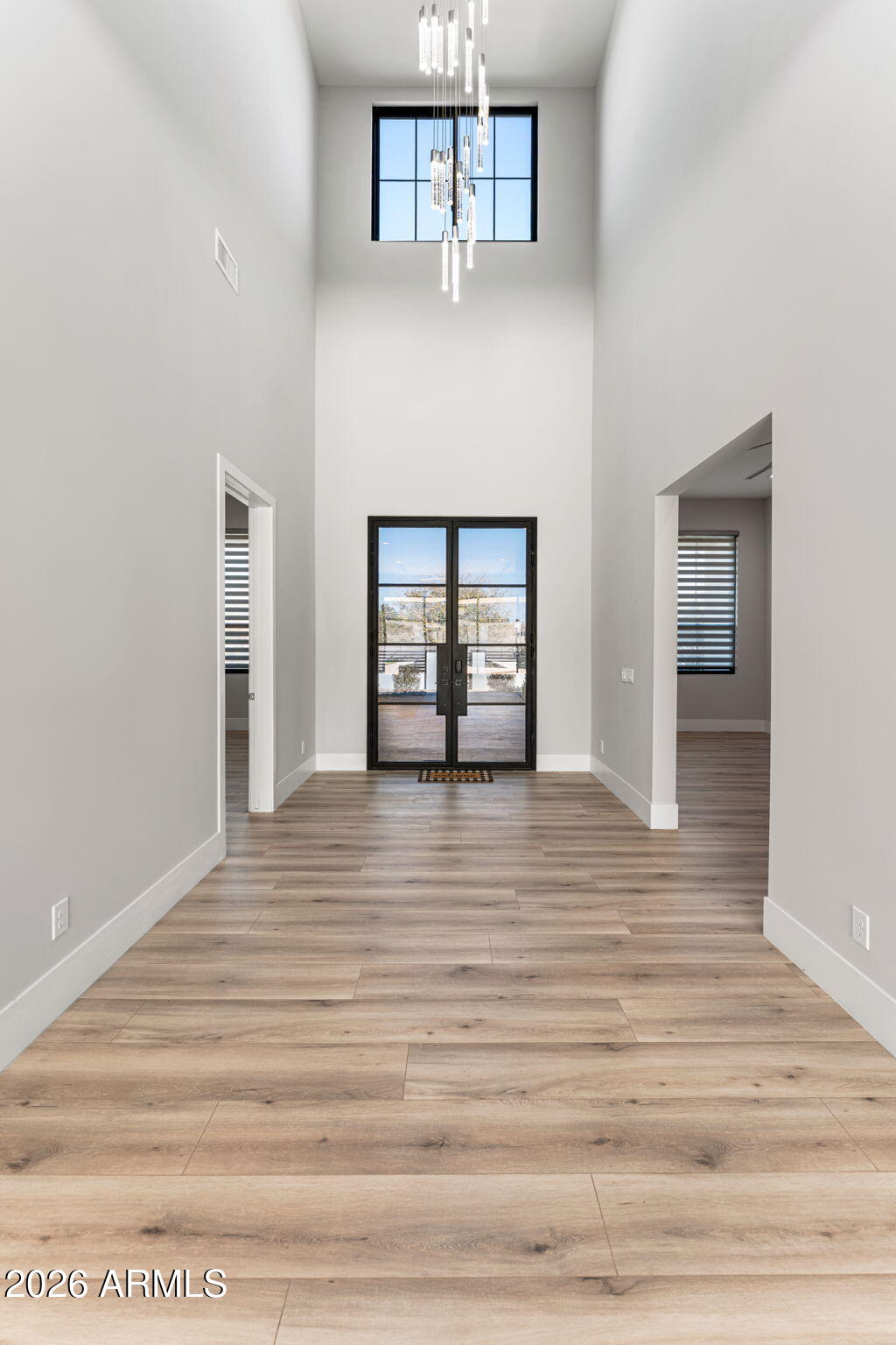 24614 South 183rd Street Gilbert, AZ 85298 - Photo 4 of 45 a view of a livingroom with wooden floor and a window